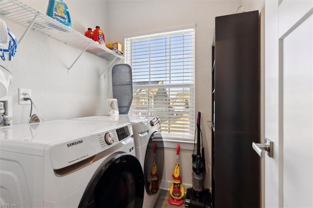 909 Porte Crayon St, Chesapeake, VA 23323 - clothes washing area with washer and dryer and a textured wall