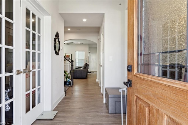909 Porte Crayon St, Chesapeake, VA 23323 - corridor featuring arched walkways, wood finished floors, french doors, baseboards, and recessed lighting