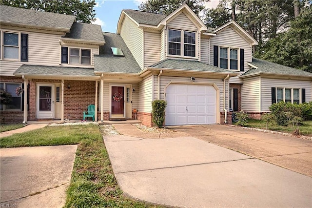 112 Two Turkey Run, Yorktown, VA 23692 - view of front of home with brick siding, concrete driveway, an attached garage, and roof with shingles