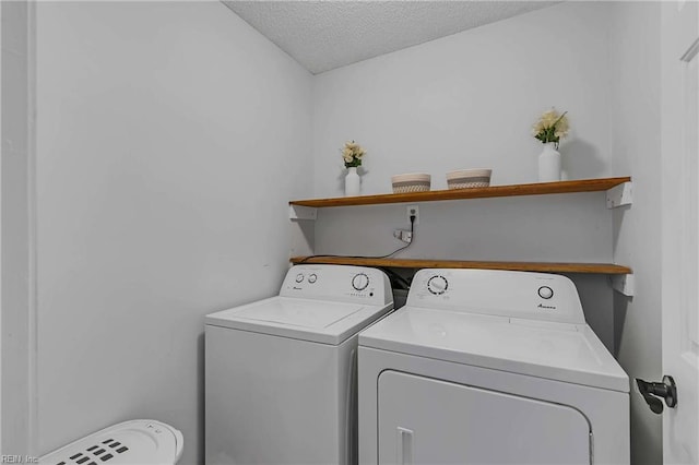 112 Two Turkey Run, Yorktown, VA 23692 - laundry room with separate washer and dryer and a textured ceiling