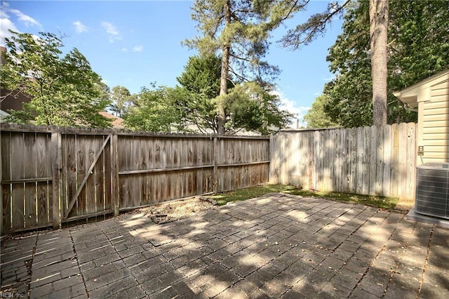 112 Two Turkey Run, Yorktown, VA 23692 - wooden terrace featuring a patio, a fenced backyard, and central AC unit