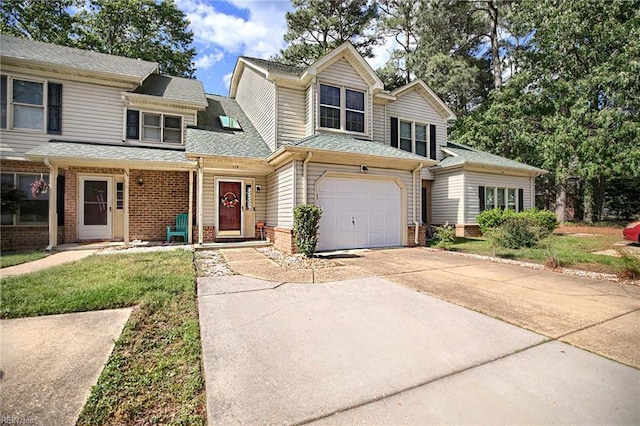 112 Two Turkey Run, Yorktown, VA 23692 - view of front facade with brick siding, concrete driveway, and an attached garage