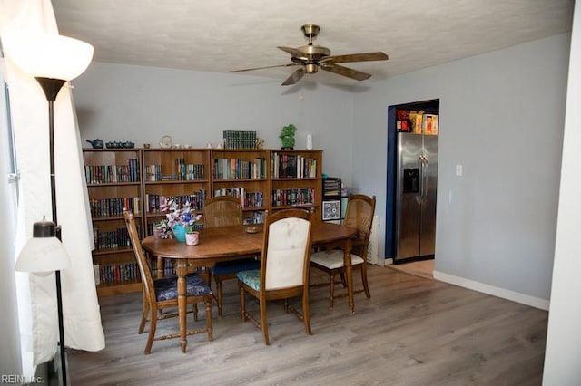 1132 Van Loen Dr, Virginia Beach, VA 23453 - dining area featuring a ceiling fan, wood finished floors, and baseboards