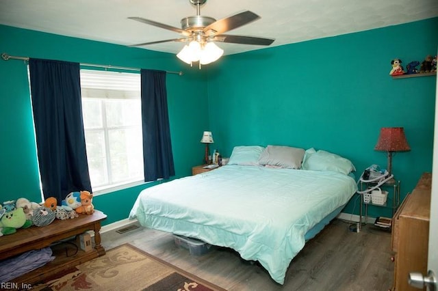 1132 Van Loen Dr, Virginia Beach, VA 23453 - bedroom with multiple windows, wood finished floors, baseboards, and ceiling fan