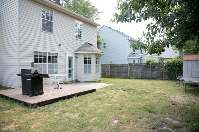 1132 Van Loen Dr, Virginia Beach, VA 23453 - rear view of house featuring a wooden deck and a trampoline