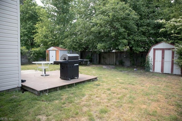 1132 Van Loen Dr, Virginia Beach, VA 23453 - view of yard featuring a storage unit, a wooden deck, and an outdoor structure