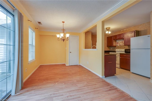 4813 Shallowford Cir, Virginia Beach, VA 23462 - unfurnished dining area with a chandelier, ornamental molding, light wood-style floors, a textured ceiling, and baseboards