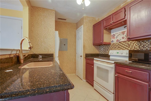 4813 Shallowford Cir, Virginia Beach, VA 23462 - kitchen with white electric range, a sink, black microwave, electric panel, and light tile patterned flooring