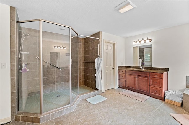 2234 Creekway Dr, Smithfield, VA 23430 - bathroom with a shower stall, vanity, tile patterned flooring, and a textured ceiling