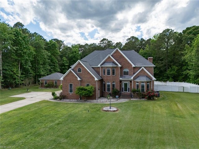 2234 Creekway Dr, Smithfield, VA 23430 - colonial home with brick siding and a chimney