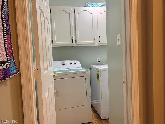 949 Kings Fork Rd, Suffolk, VA 23434 - washroom featuring washing machine and dryer and cabinet space