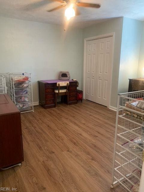 949 Kings Fork Rd, Suffolk, VA 23434 - bedroom with wood finished floors, baseboards, a ceiling fan, and a closet