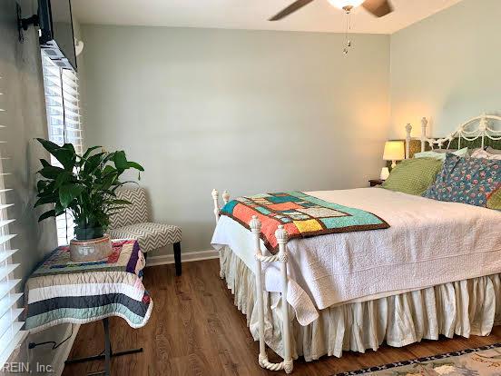 949 Kings Fork Rd, Suffolk, VA 23434 - bedroom featuring wood finished floors, ceiling fan, and baseboards