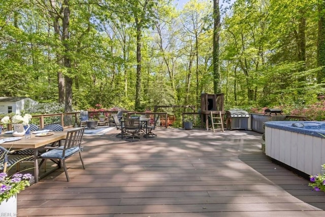 wooden deck with outdoor dining space