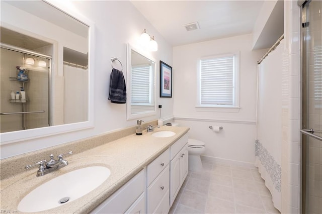 338 W Olney Rd, Norfolk, VA 23507 - full bathroom featuring curtained shower, tile patterned floors, double vanity, and toilet