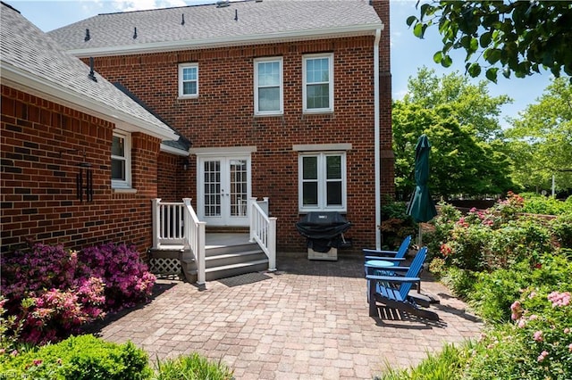338 W Olney Rd, Norfolk, VA 23507 - rear view of house with french doors, a patio, and brick siding