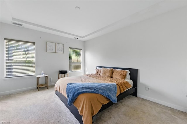 bedroom featuring carpet flooring and baseboards