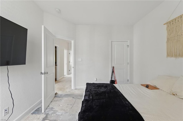 bedroom with baseboards