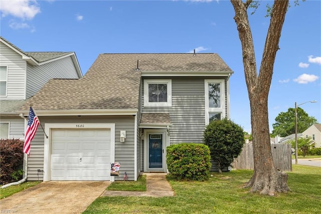 view of front of home with roof with shingles, driveway, and an attached garage