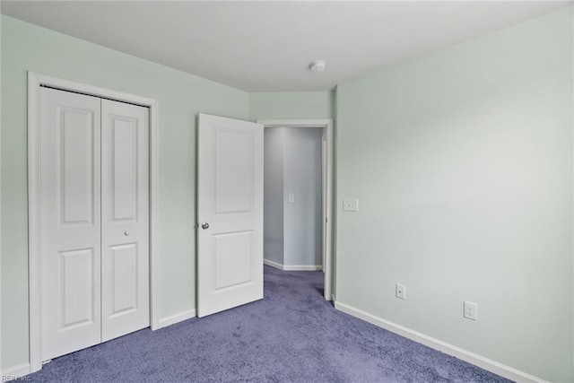 703 Lakeview Cv, Smithfield, VA 23430 - unfurnished bedroom featuring carpet flooring, baseboards, and a closet