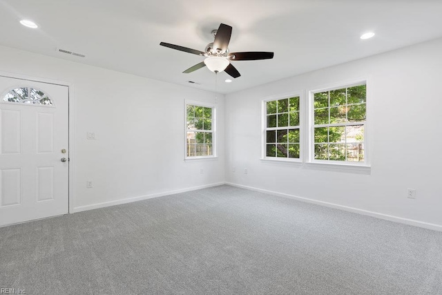 unfurnished room with baseboards, carpet, ceiling fan, and recessed lighting