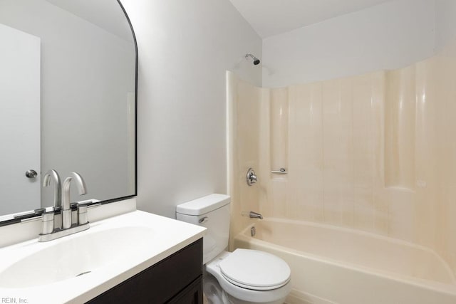 full bath featuring toilet, vanity, and  shower combination