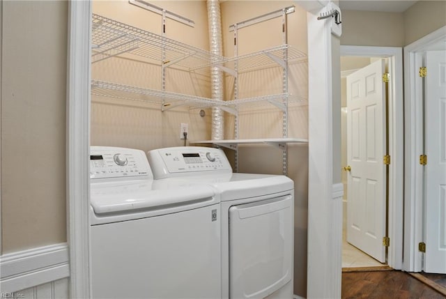 laundry area featuring separate washer and dryer