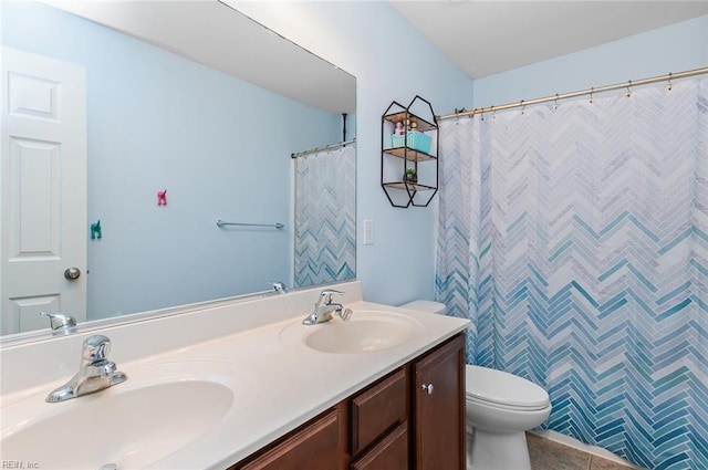 full bathroom featuring toilet, double vanity, tile patterned flooring, and a shower with shower curtain