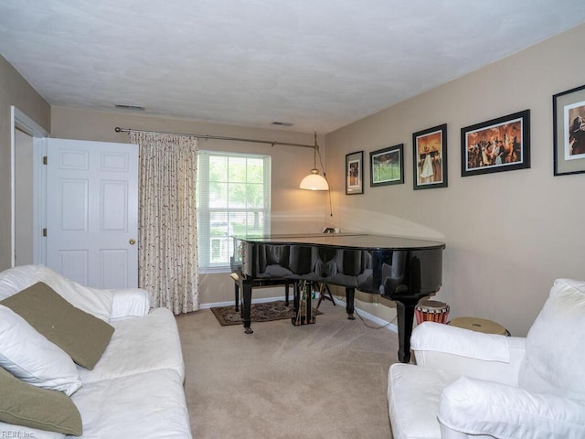 living area with carpet flooring and baseboards