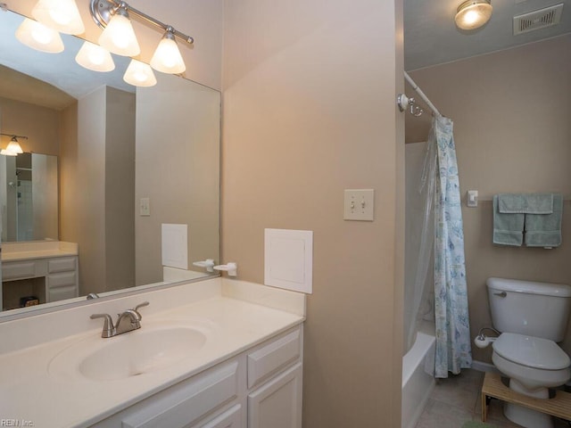 full bathroom featuring toilet, vanity, tile patterned flooring, and shower / bathtub combination with curtain