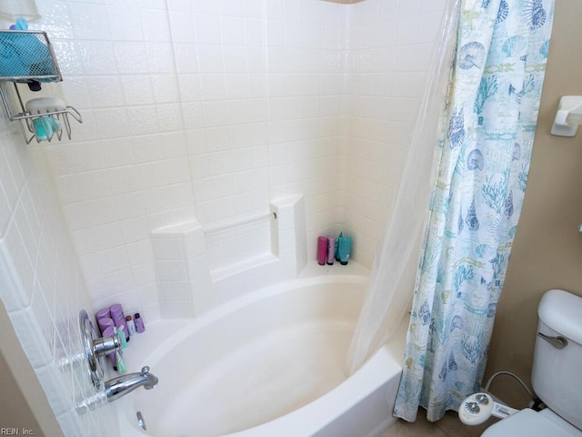 full bath featuring toilet and shower / tub combo
