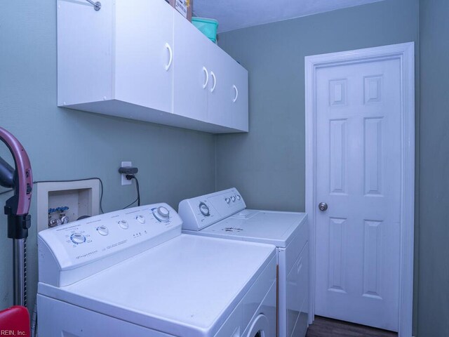 laundry room featuring cabinet space and washer and dryer