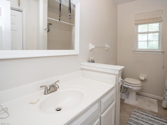 bathroom with toilet, vanity, tile patterned flooring, and a shower with shower curtain