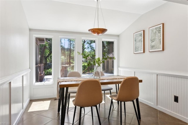 1276 Hebden Cv, Virginia Beach, VA 23452 - tiled dining room with vaulted ceiling, wainscoting, and a decorative wall