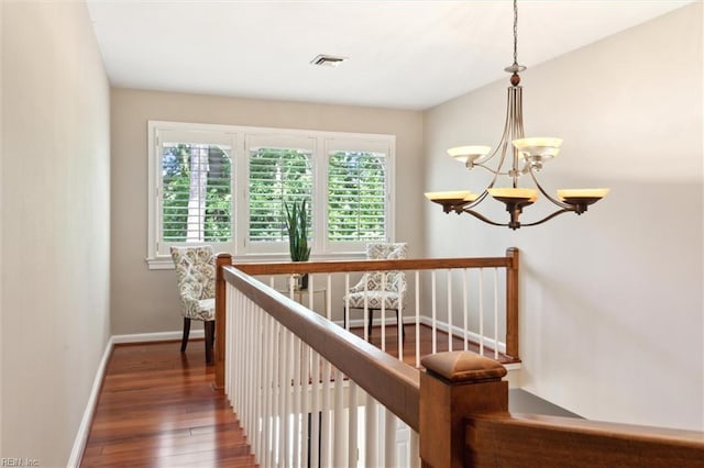 1276 Hebden Cv, Virginia Beach, VA 23452 - staircase with hardwood / wood-style flooring, baseboards, and a chandelier