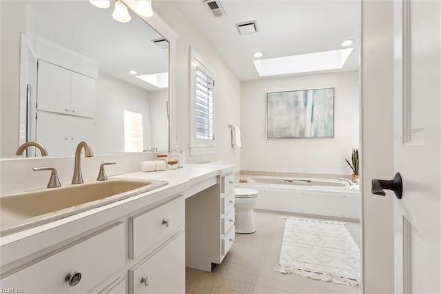 1276 Hebden Cv, Virginia Beach, VA 23452 - full bathroom featuring a skylight, vanity, a bath, toilet, and recessed lighting