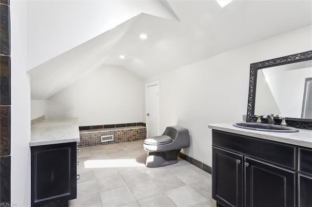 1276 Hebden Cv, Virginia Beach, VA 23452 - bathroom with lofted ceiling, toilet, tile patterned floors, vanity, and recessed lighting