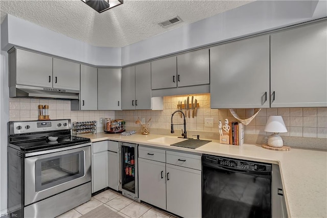 3032 Cape Henry Ct, Virginia Beach, VA 23451 - kitchen featuring stainless steel electric stove, dishwasher, beverage cooler, under cabinet range hood, and gray cabinets
