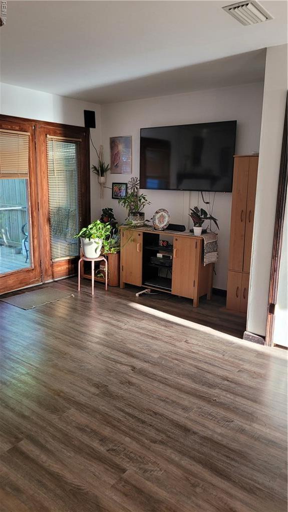 living area featuring dark wood finished floors