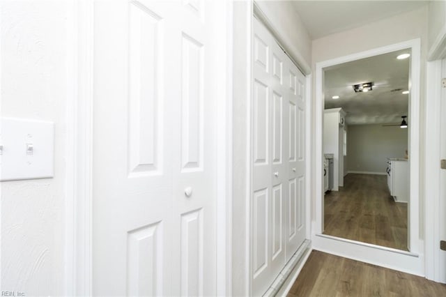 corridor with wood finished floors