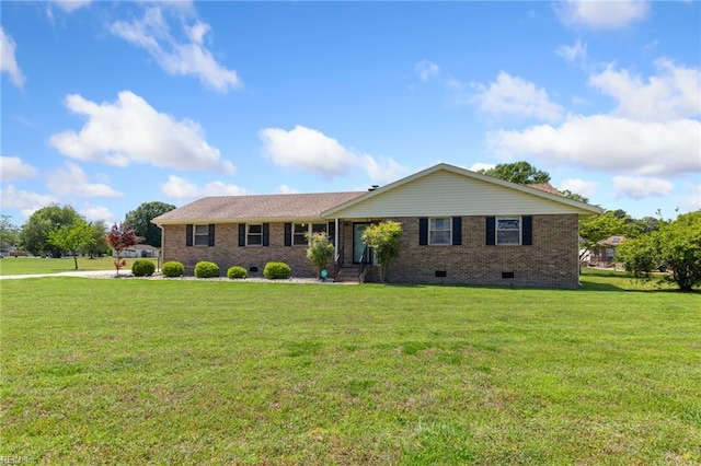 single story home with crawl space, a front yard, and brick siding