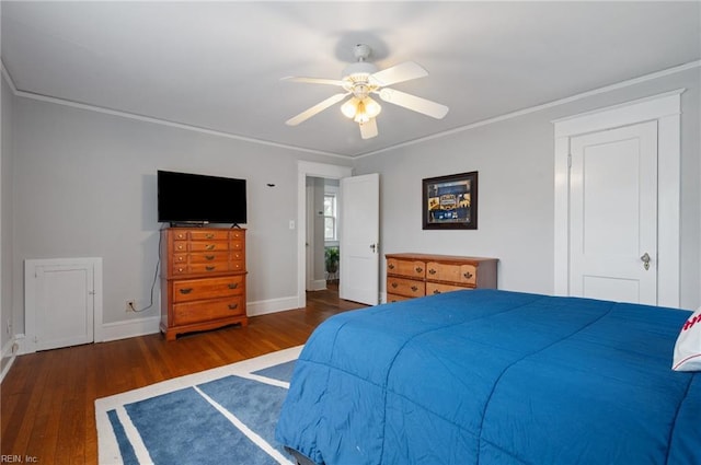 bedroom featuring wood finished floors, baseboards, ceiling fan, and ornamental molding