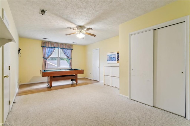 16 Windy Point Dr, Poquoson, VA 23662 - game room with light carpet, a ceiling fan, billiards, baseboards, and a textured ceiling