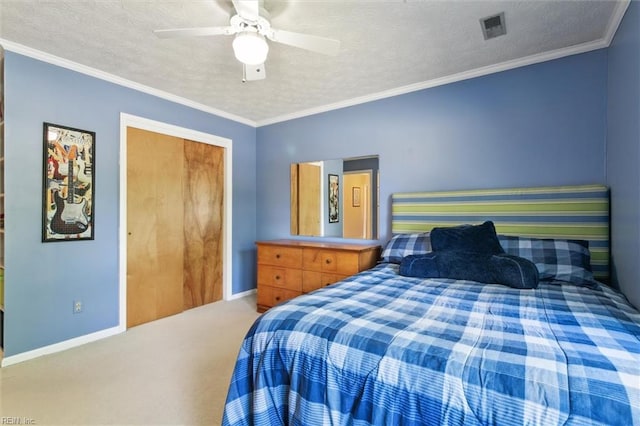 16 Windy Point Dr, Poquoson, VA 23662 - bedroom with carpet, a textured ceiling, baseboards, a ceiling fan, and a closet
