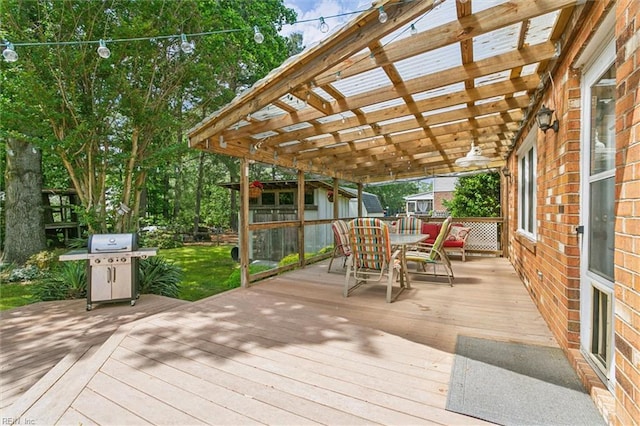 16 Windy Point Dr, Poquoson, VA 23662 - deck with outdoor dining space, a pergola, and grilling area