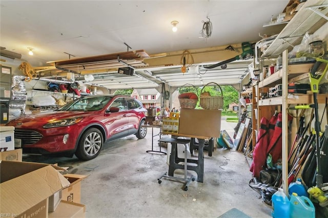 16 Windy Point Dr, Poquoson, VA 23662 - garage featuring a garage door opener