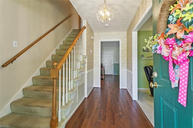 16 Windy Point Dr, Poquoson, VA 23662 - foyer entrance featuring stairway, hardwood / wood-style flooring, a chandelier, baseboards, and wallpapered walls