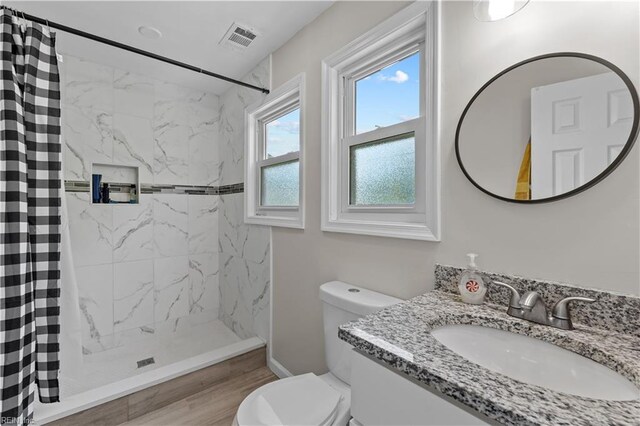 3701 Edinburgh Dr, Virginia Beach, VA 23452 - bathroom featuring toilet, a shower stall, vanity, and wood finished floors