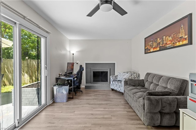 3701 Edinburgh Dr, Virginia Beach, VA 23452 - living area featuring light wood-style floors, a ceiling fan, and a brick fireplace