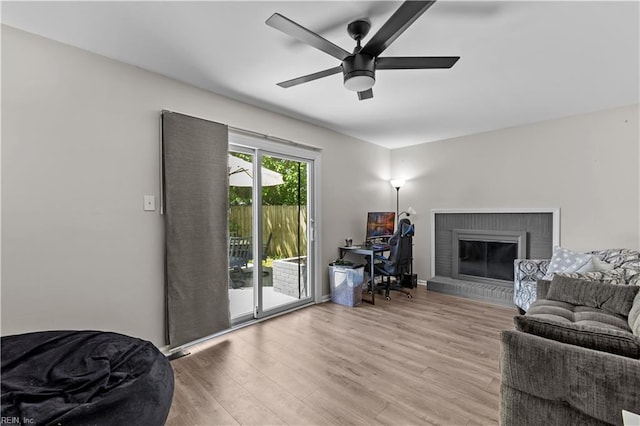 3701 Edinburgh Dr, Virginia Beach, VA 23452 - living room with a fireplace, light wood-style flooring, and a ceiling fan